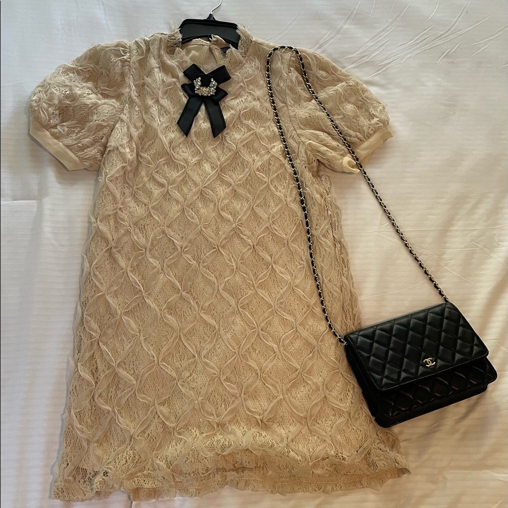 A cream colored dress by Vici in a size small